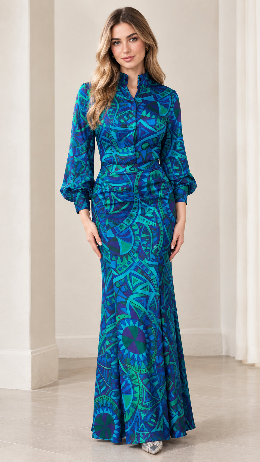 Front view of model wearing royal blue geometric print stand collar mermaid maxi dress