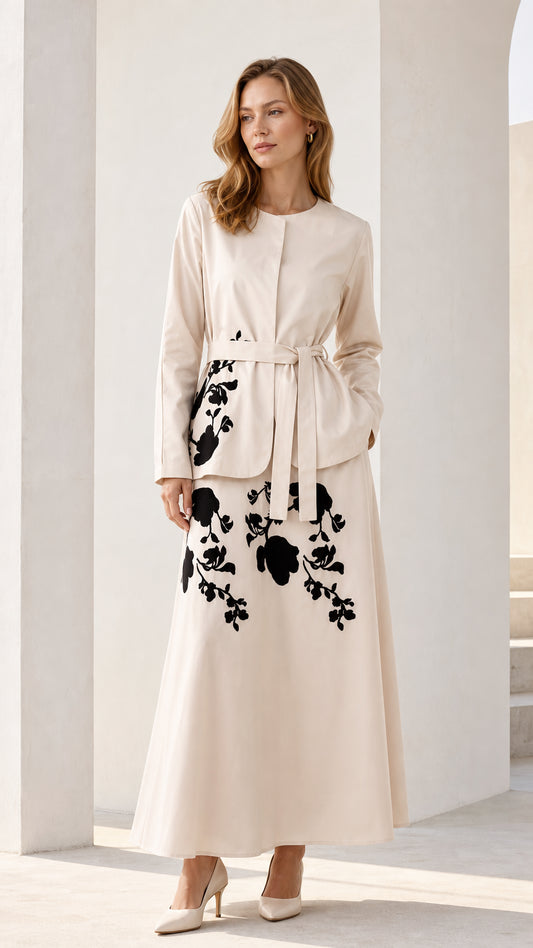 Front view of beige floral embroidered belted maxi dress