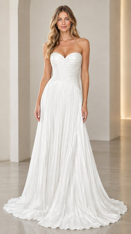 Front view of model wearing white strapless sweetheart pleated evening gown
