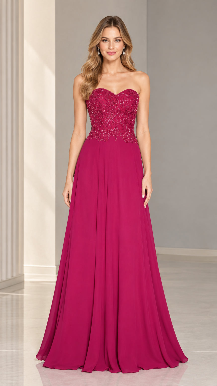Front full-length view of woman wearing strapless beaded magenta evening gown