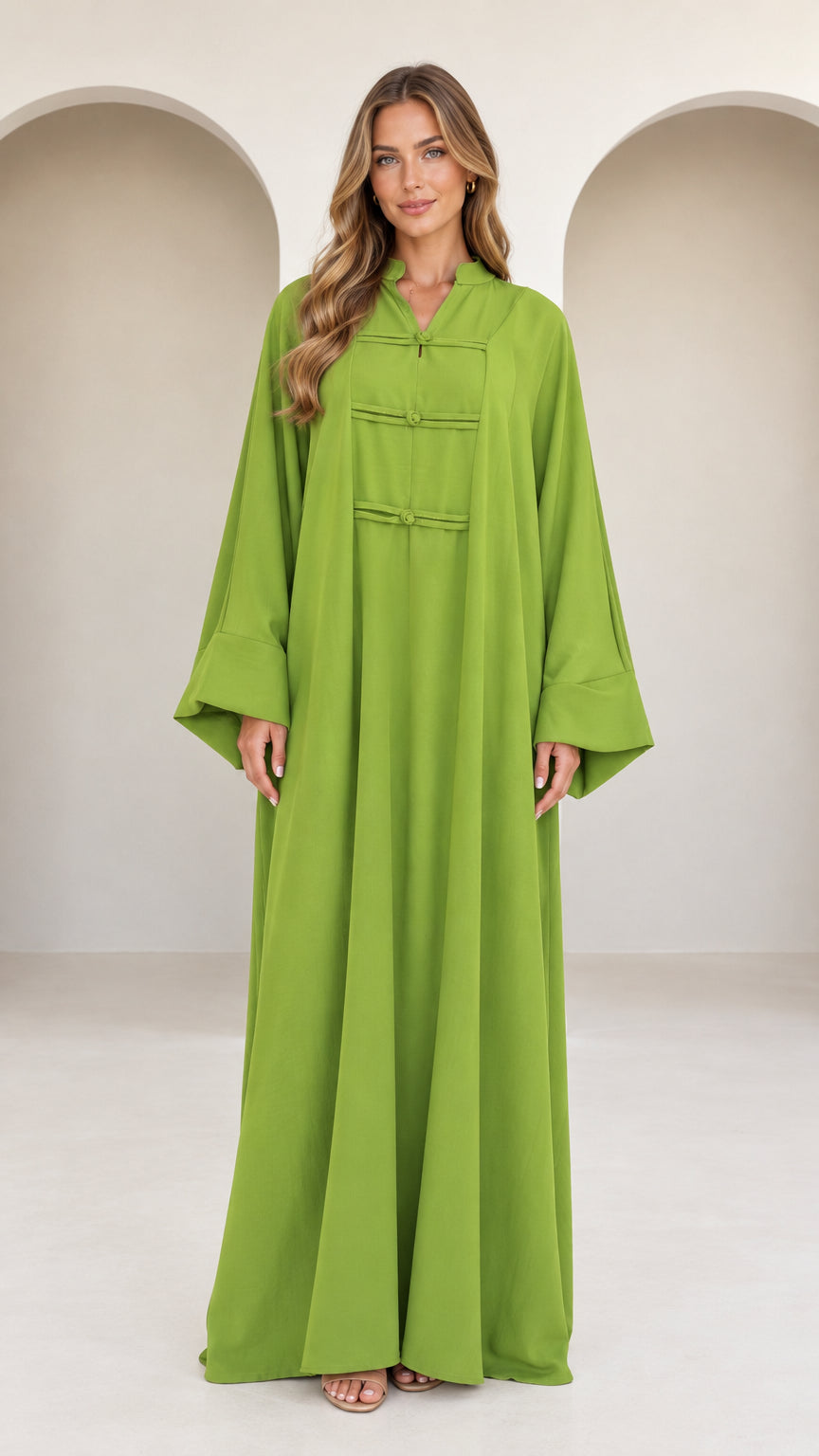 Front view of model wearing olive green mandarin collar frog button long sleeve abaya maxi dress