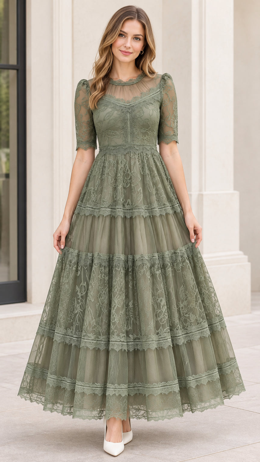 Front view of model wearing sage green floral lace tiered maxi dress with illusion neckline