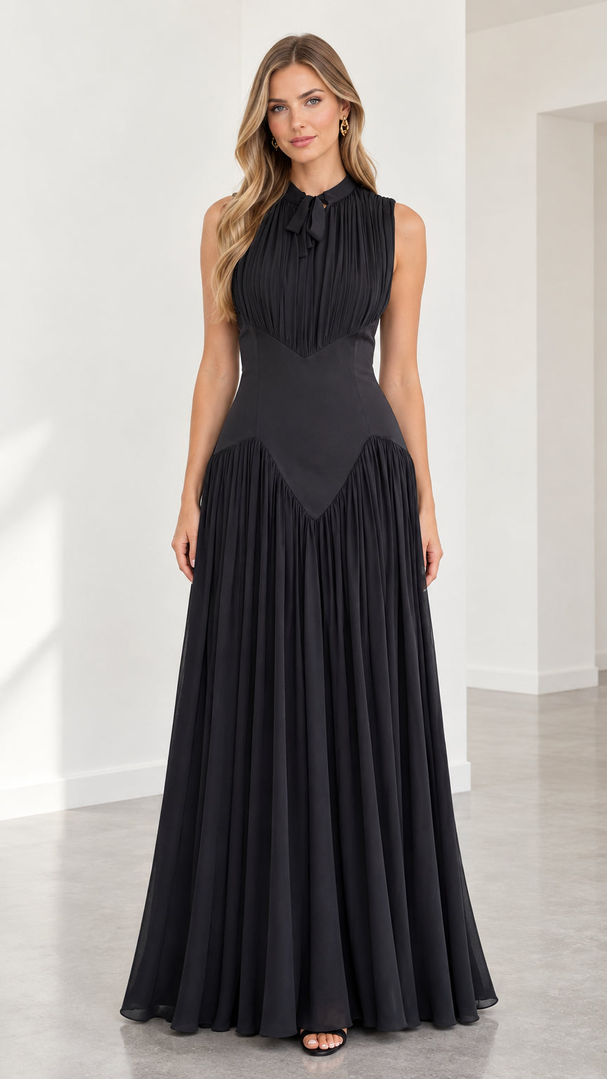 Front view of black sleeveless pleated maxi evening dress with tie neckline