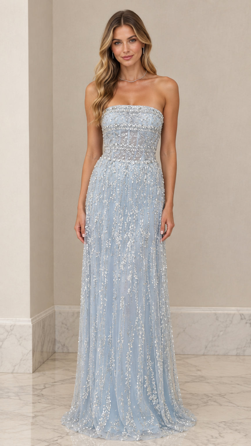 Front view of model wearing Light Blue strapless beaded corset evening gown