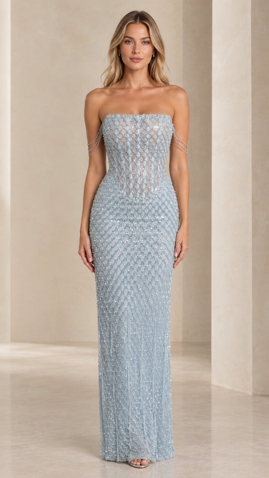 Front view of model wearing Ice Blue strapless beaded corset evening gown