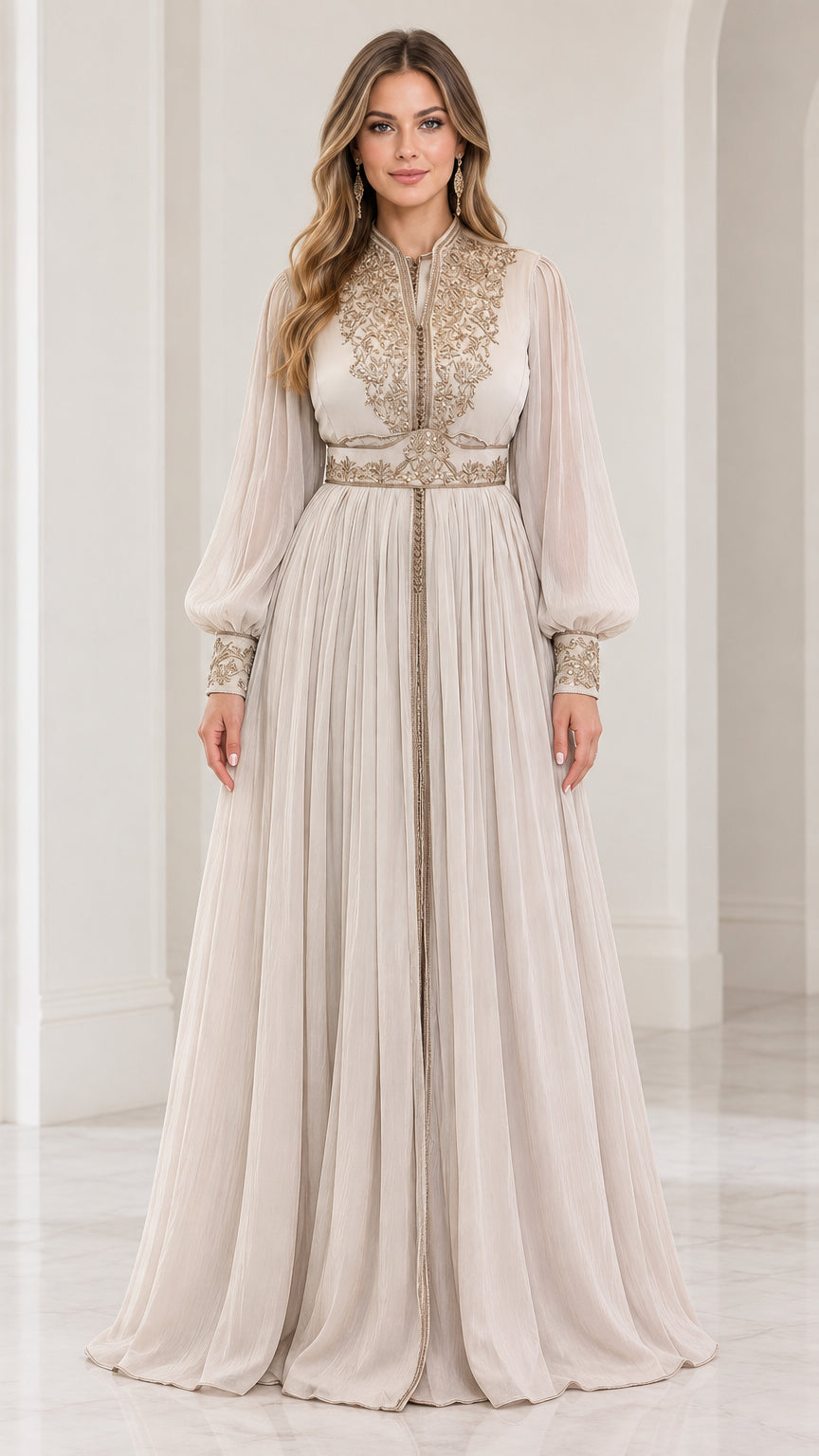 Front view of model wearing champagne embroidered long sleeve kaftan maxi dress