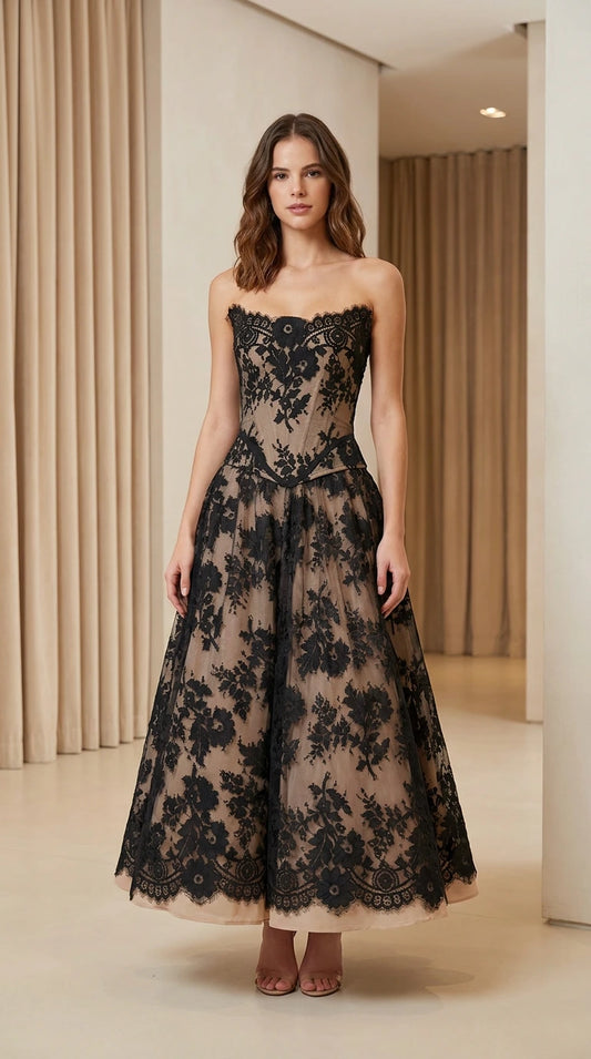 Model wearing strapless lace corset midi dress front view