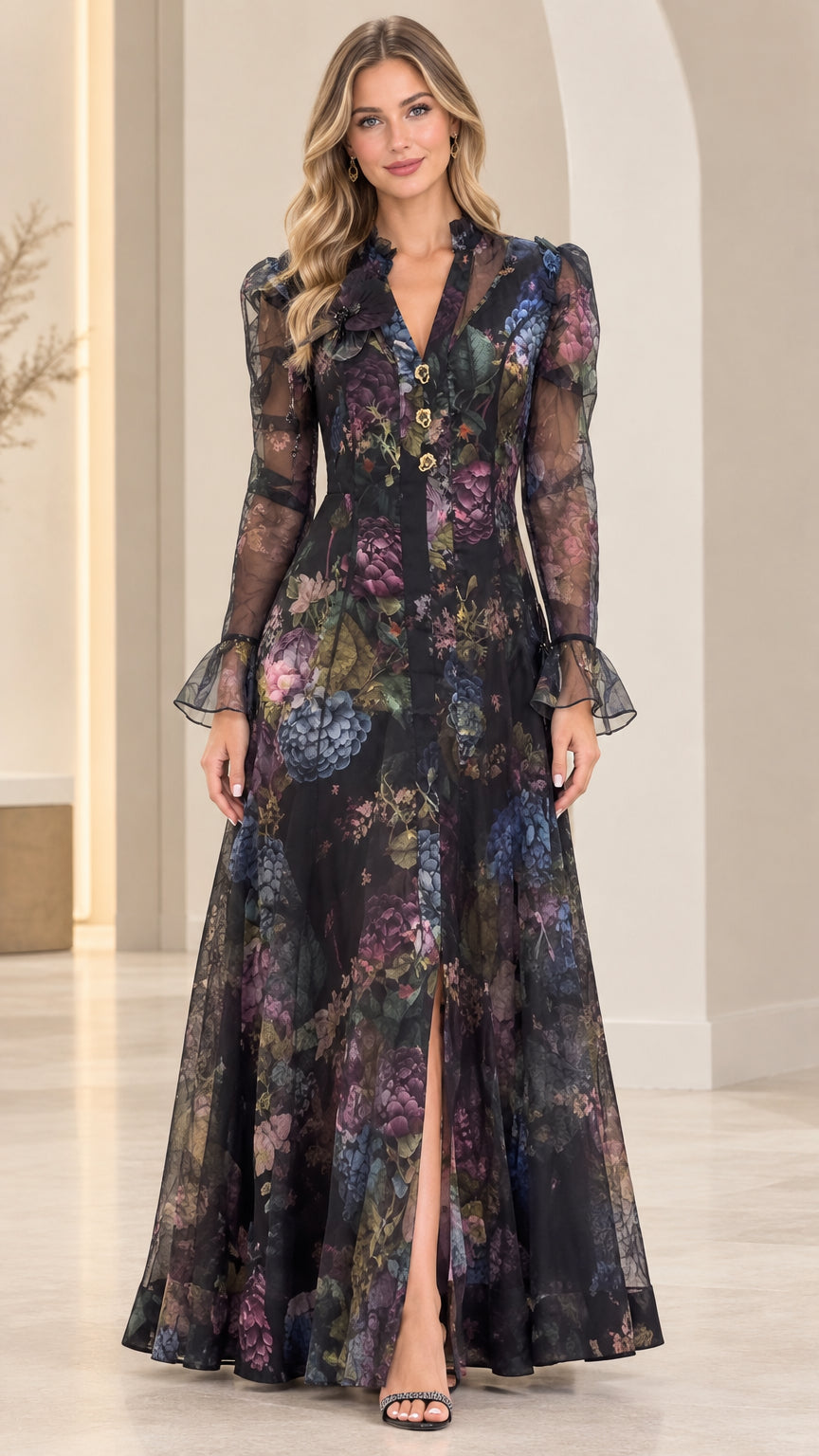 Front view of black floral print sheer long sleeve maxi dress with front slit