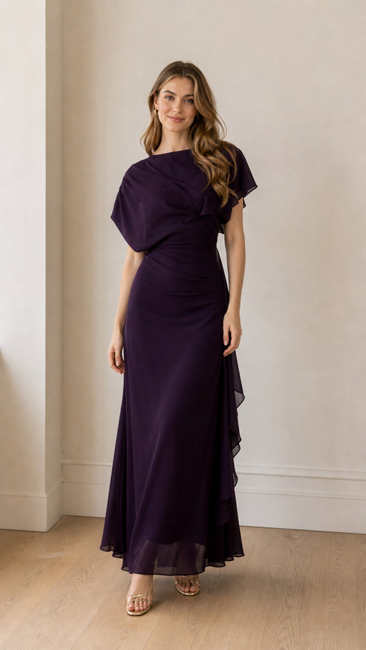Front view of model wearing the purple chiffon capelet maxi dress
