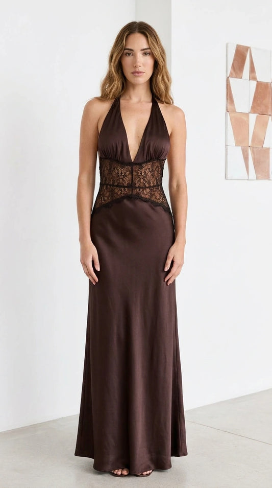 Front view of model wearing brown satin halter maxi dress