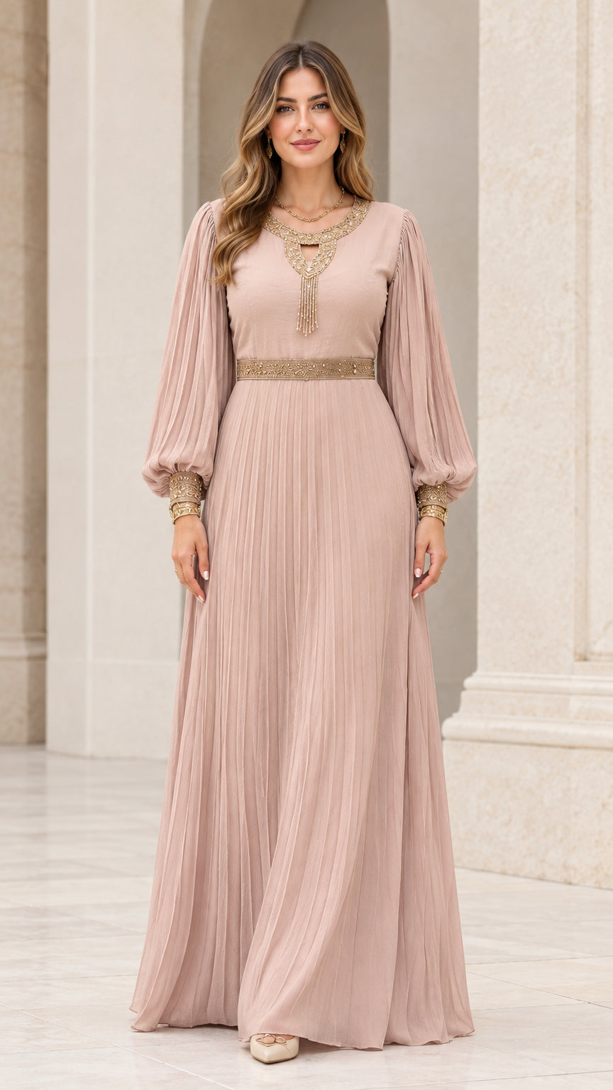 Full front view of model wearing dusty rose pleated long sleeve maxi dress with gold embroidery