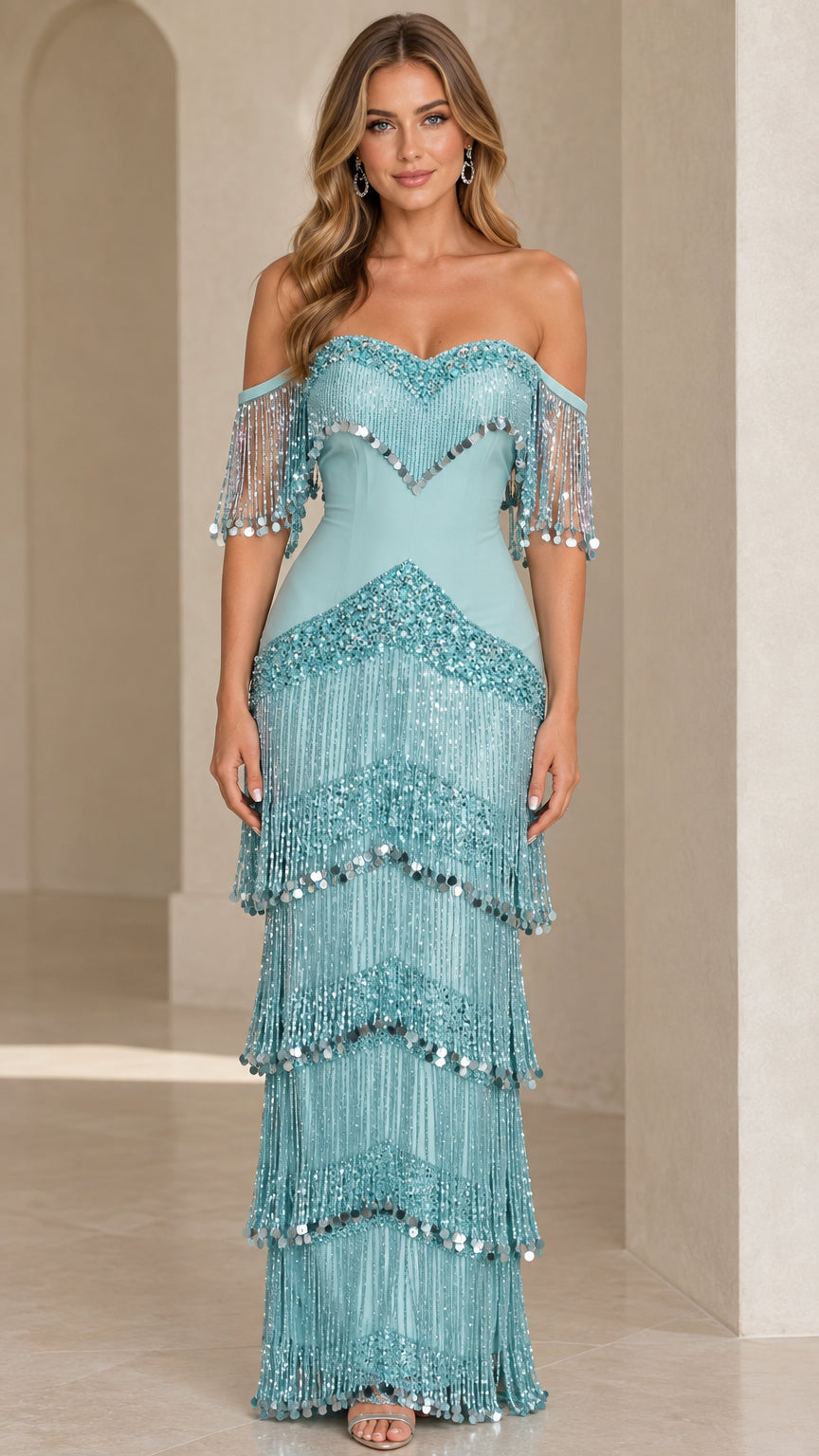 Front view of aqua blue off-the-shoulder tiered fringe sequined maxi evening gown