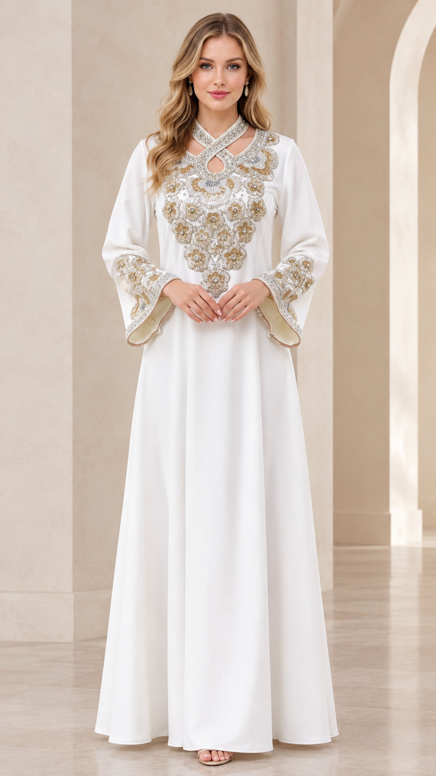 Front view of woman wearing white embellished maxi kaftan dress with bell sleeves