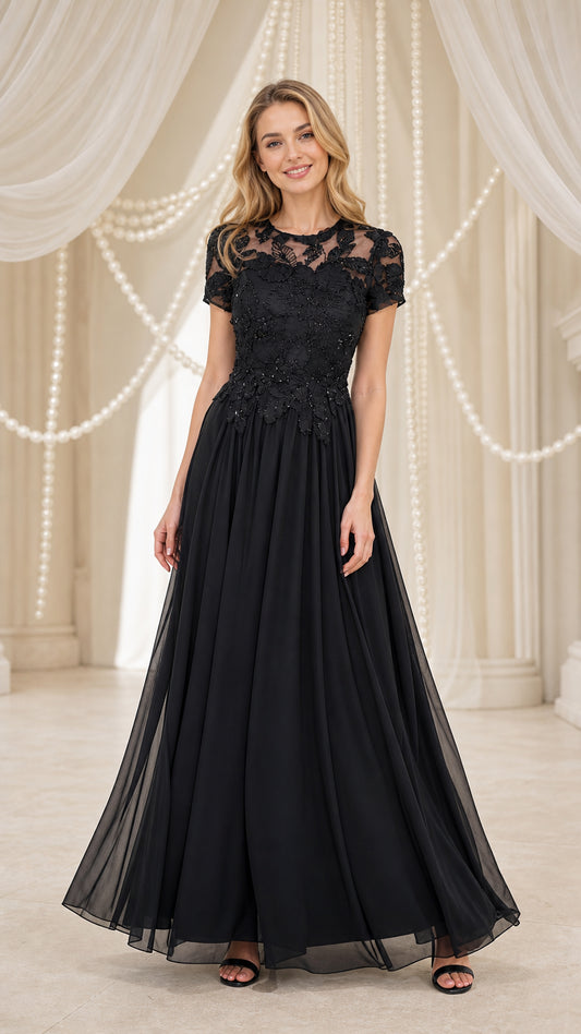 Model wearing black lace applique chiffon evening dress, front view