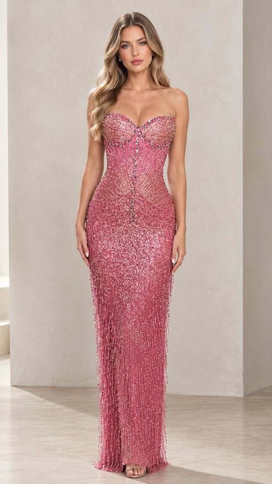 Front view of woman wearing strapless rose pink beaded fringe evening gown