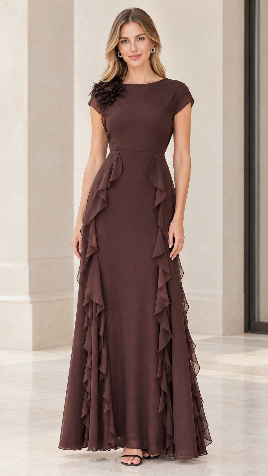 Front view of woman wearing chocolate brown floral appliqué ruffle evening gown