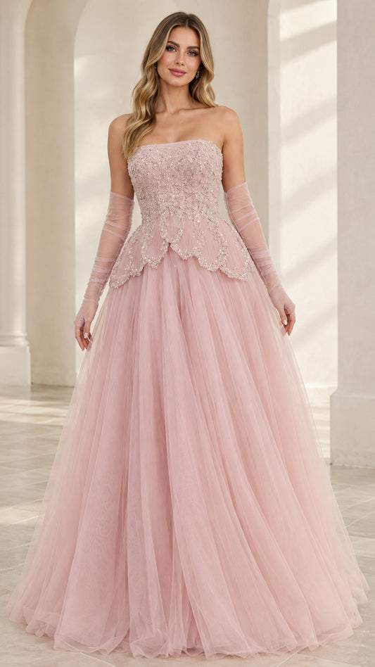 Front view of model wearing Blush Pink strapless beaded tulle ball gown with matching sheer gloves