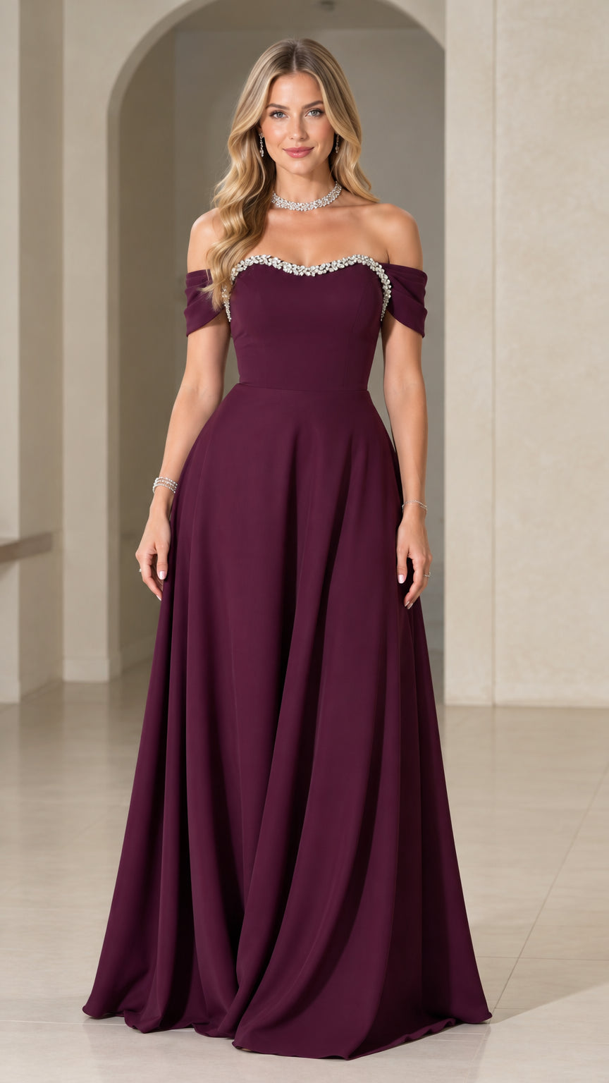 Front view of model wearing burgundy off-the-shoulder evening gown with rhinestone neckline