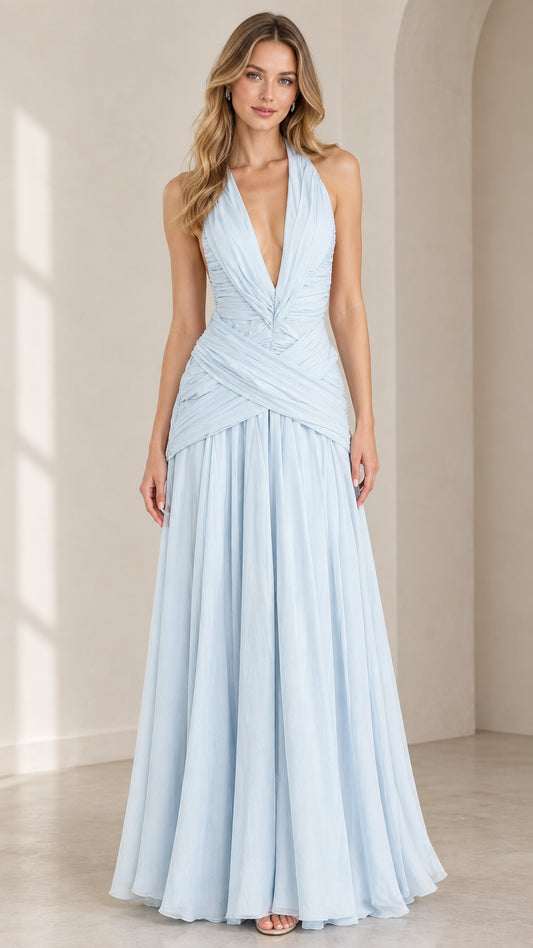 Front view of woman wearing sky blue pleated halter plunge maxi evening dress
