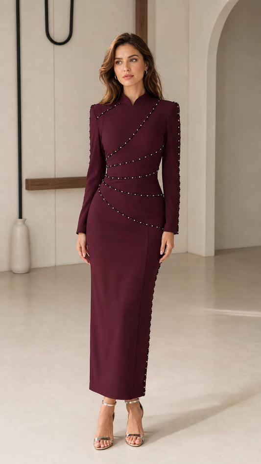 Burgundy long sleeve sheath maxi dress with stand collar and beaded trim front view