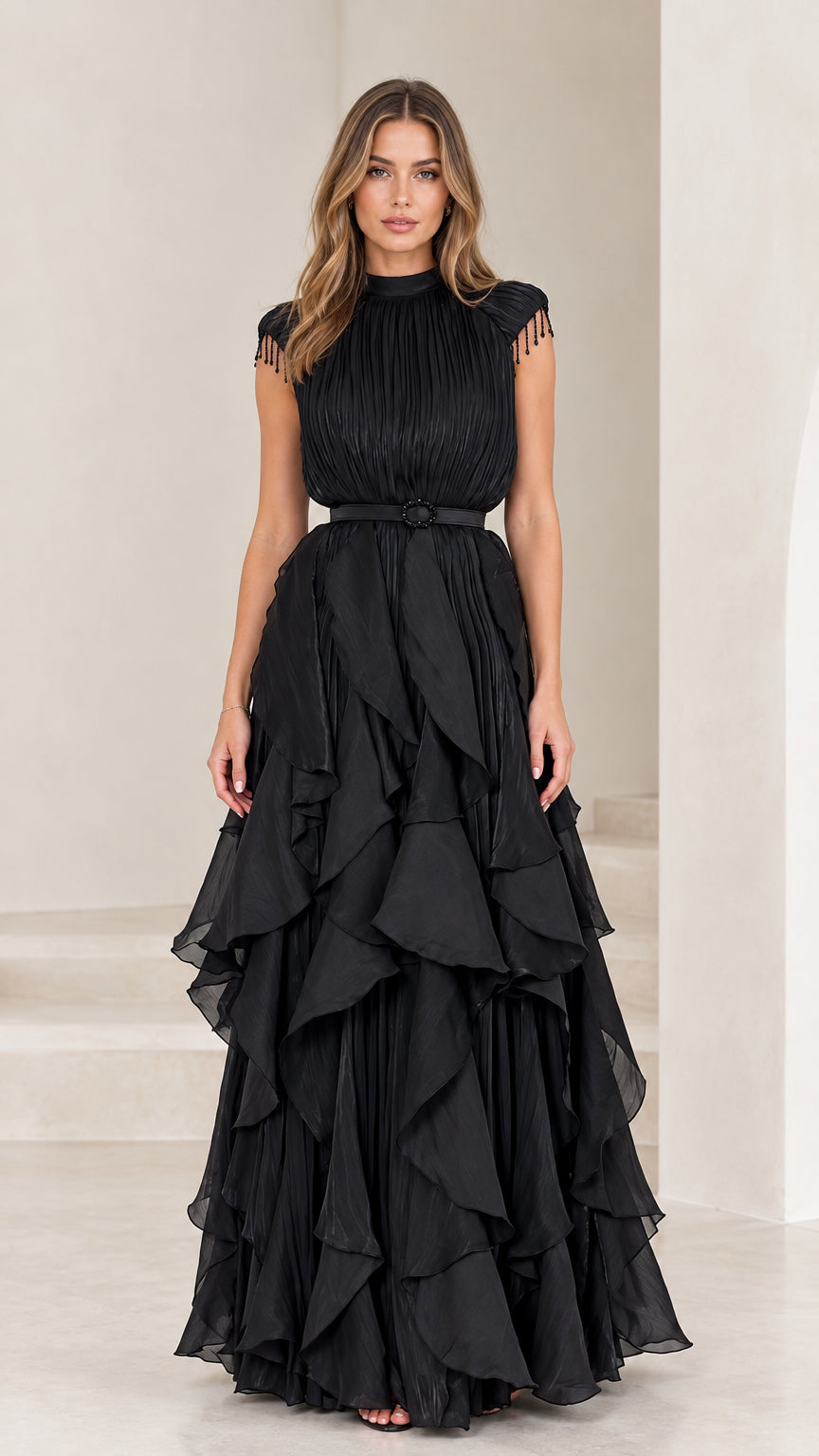 Front view of black pleated high neck tiered ruffle evening gown