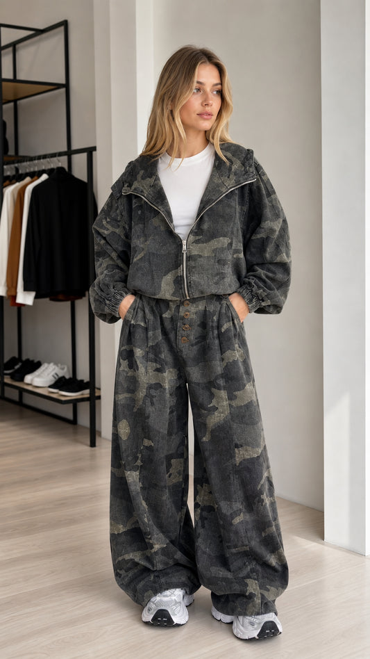 Front view of a woman wearing the charcoal camouflage cropped jacket and wide-leg pants set