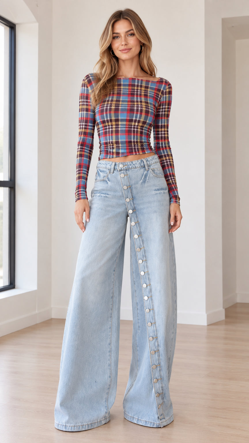 Front full-length view of model in Blue Plaid long sleeve boatneck crop top with wide leg jeans
