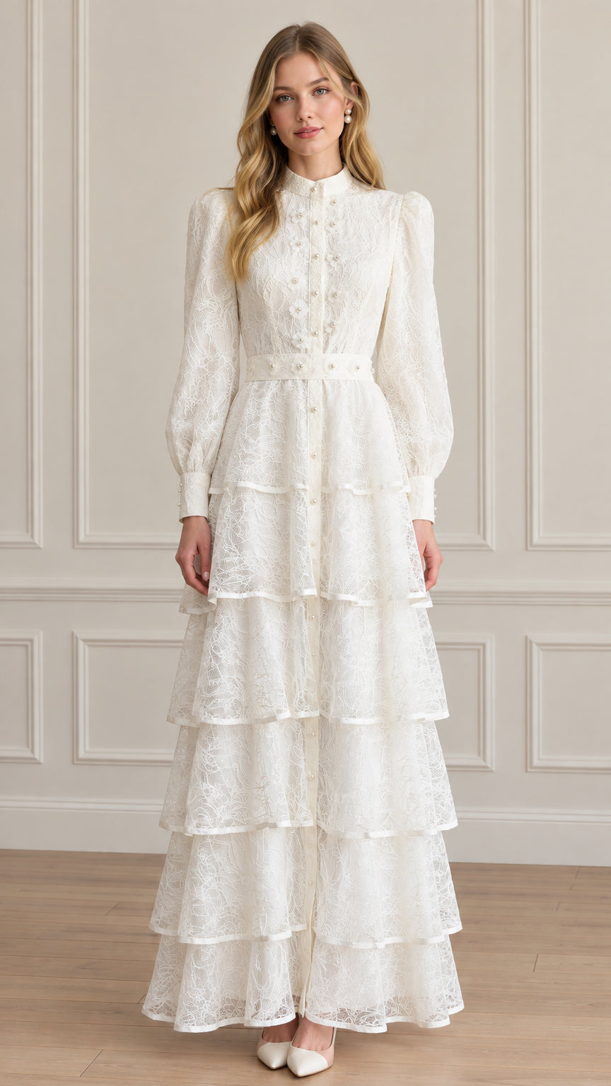 Full front view of model wearing white tiered lace high neck maxi dress with pearl accents