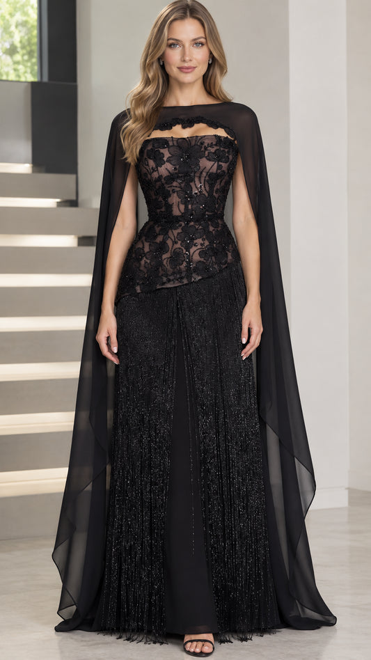 Front view of black strapless beaded evening gown with sheer cape overlay