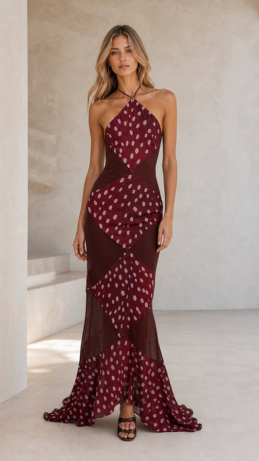 Front view of burgundy halter polka dot maxi dress