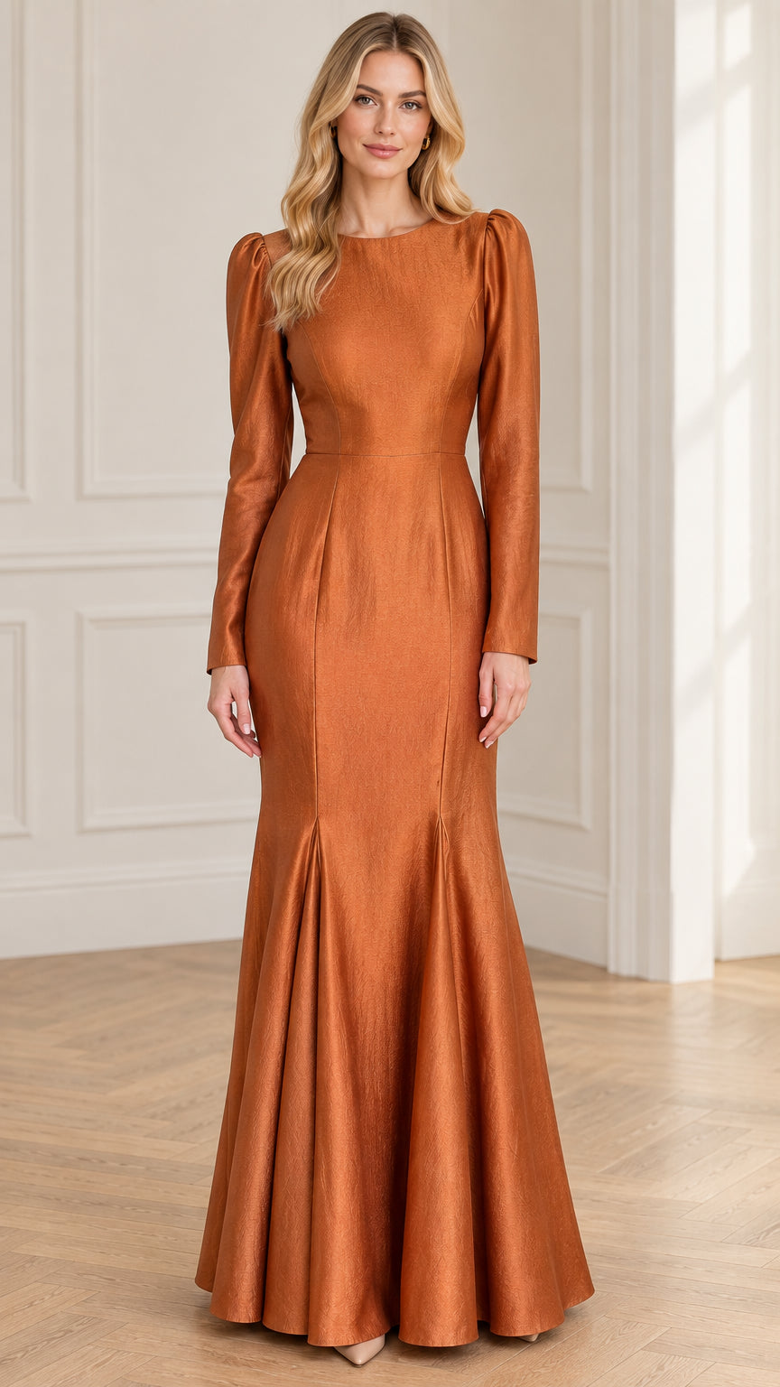 Front view of woman wearing Rust Orange long sleeve jacquard mermaid evening gown