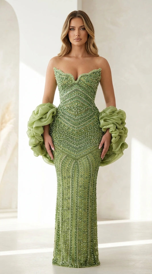 Front view of sage green beaded strapless evening gown with ruffled sleeves
