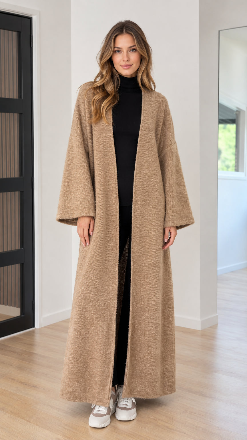 Model wearing camel longline open-front knit duster cardigan front view