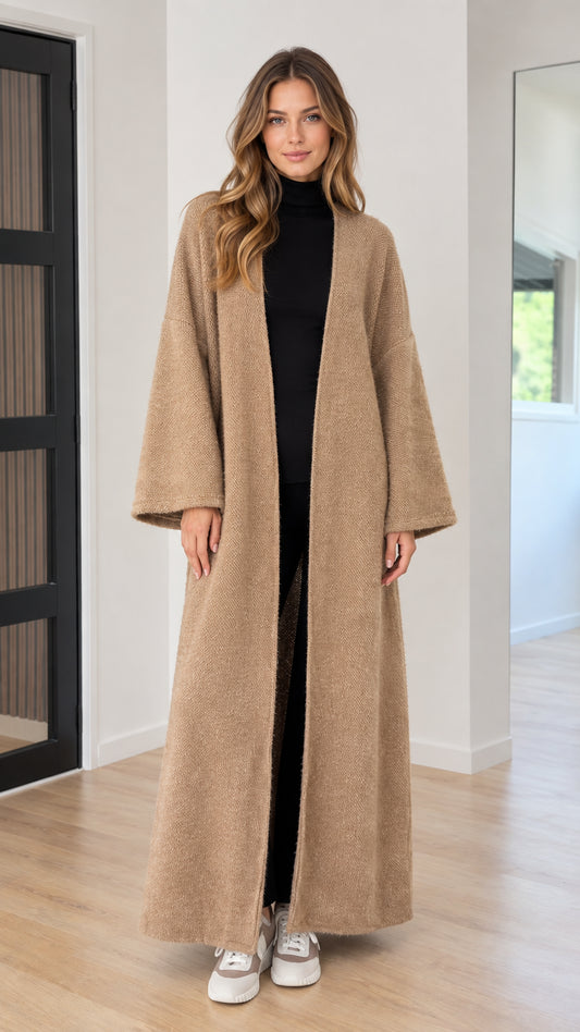 Model wearing camel longline open-front knit duster cardigan front view