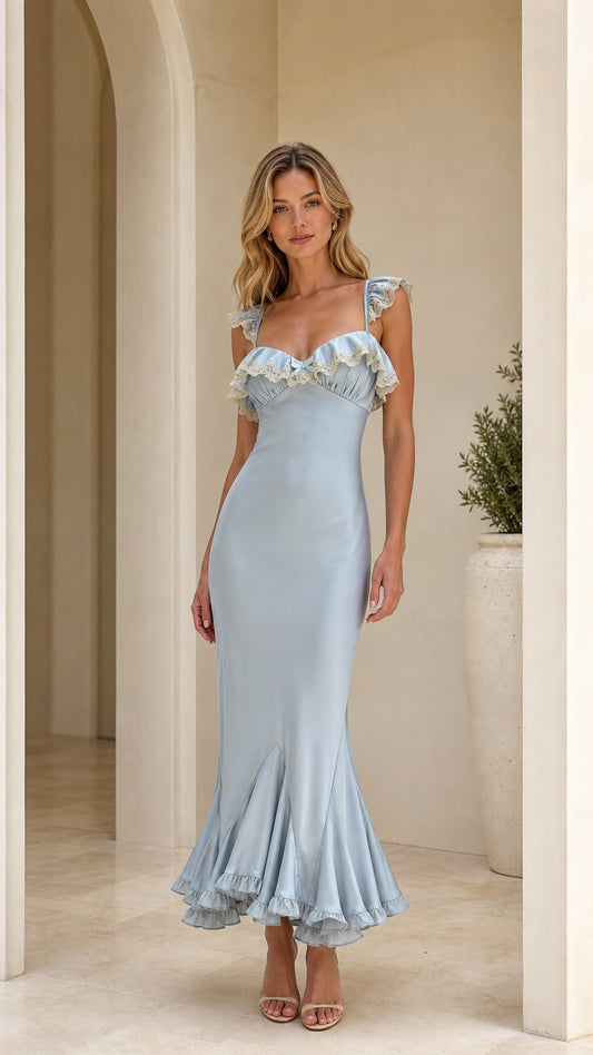 Model wearing light blue ruffle trim maxi dress front view