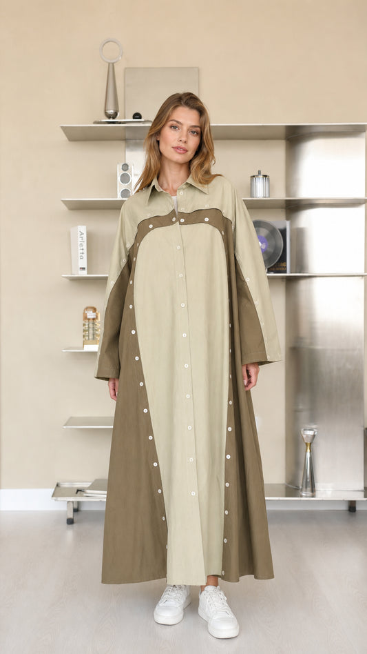 Front view of woman wearing sage green and olive colorblock maxi shirt dress