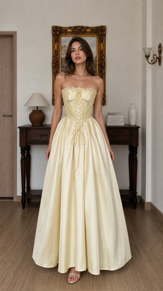 Front view of yellow corset ball gown maxi dress