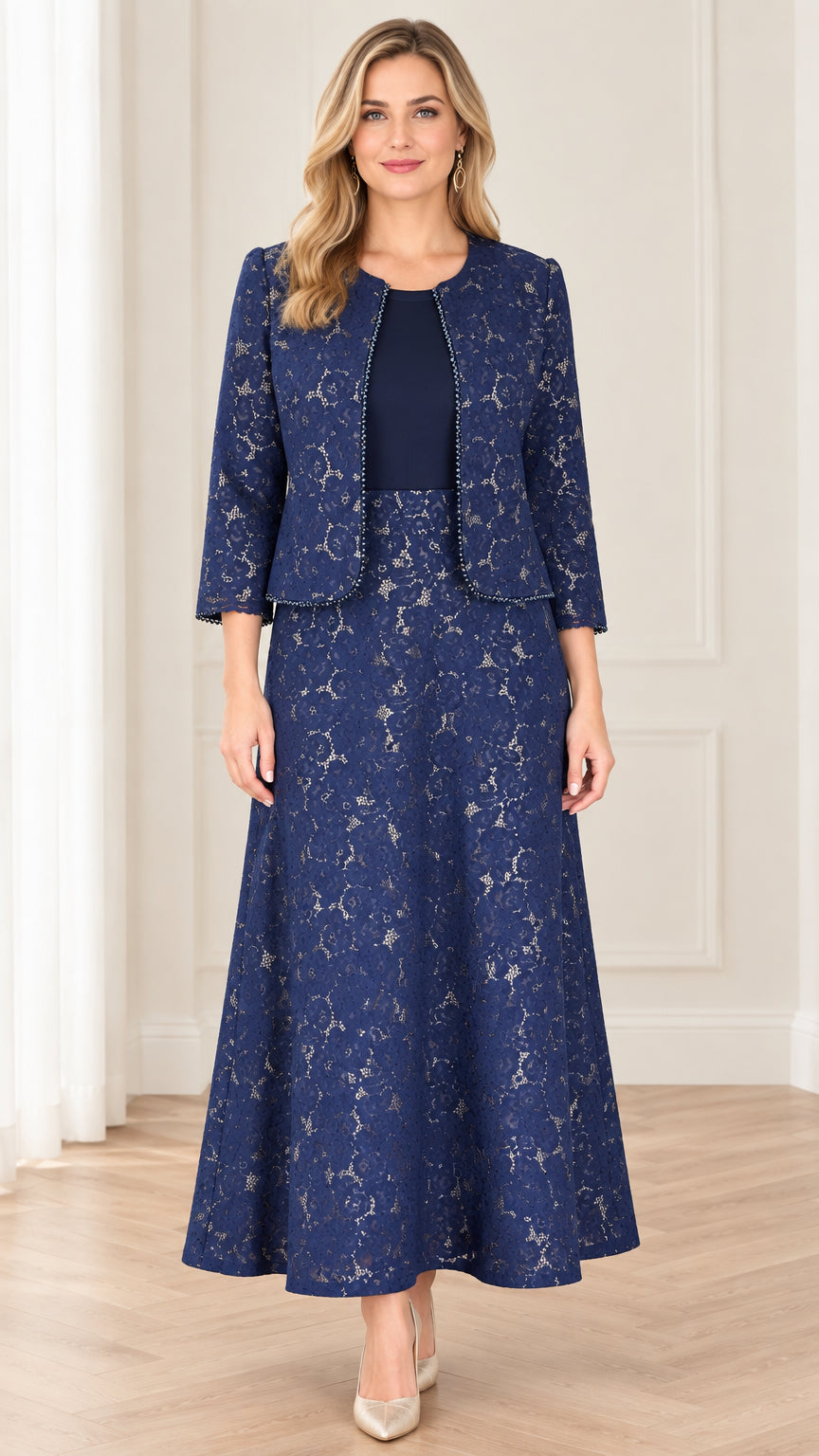Front view of woman wearing navy blue floral lace two-piece maxi dress set with beaded jacket