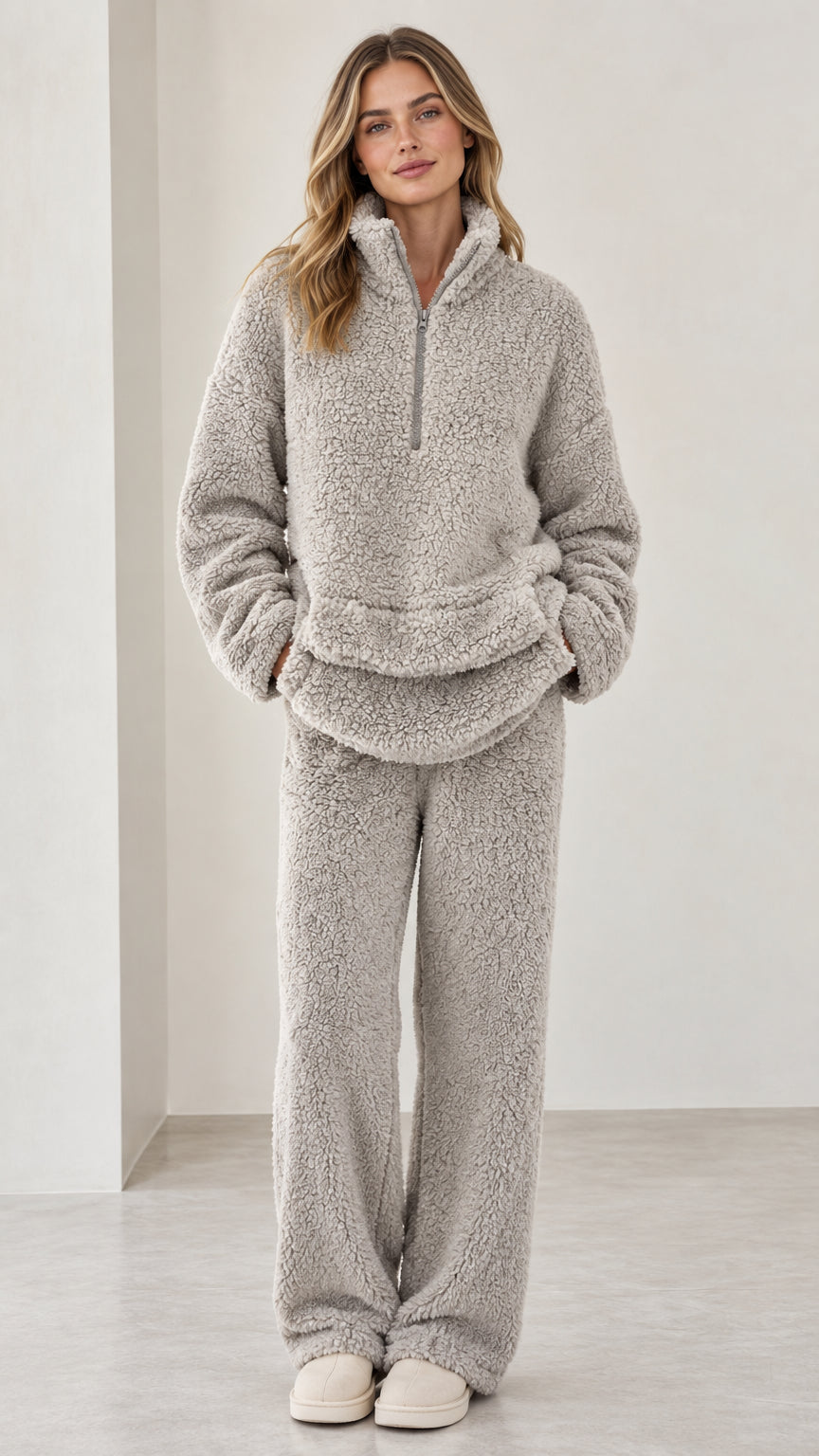 Full front view of model wearing light gray sherpa fleece quarter-zip loungewear set