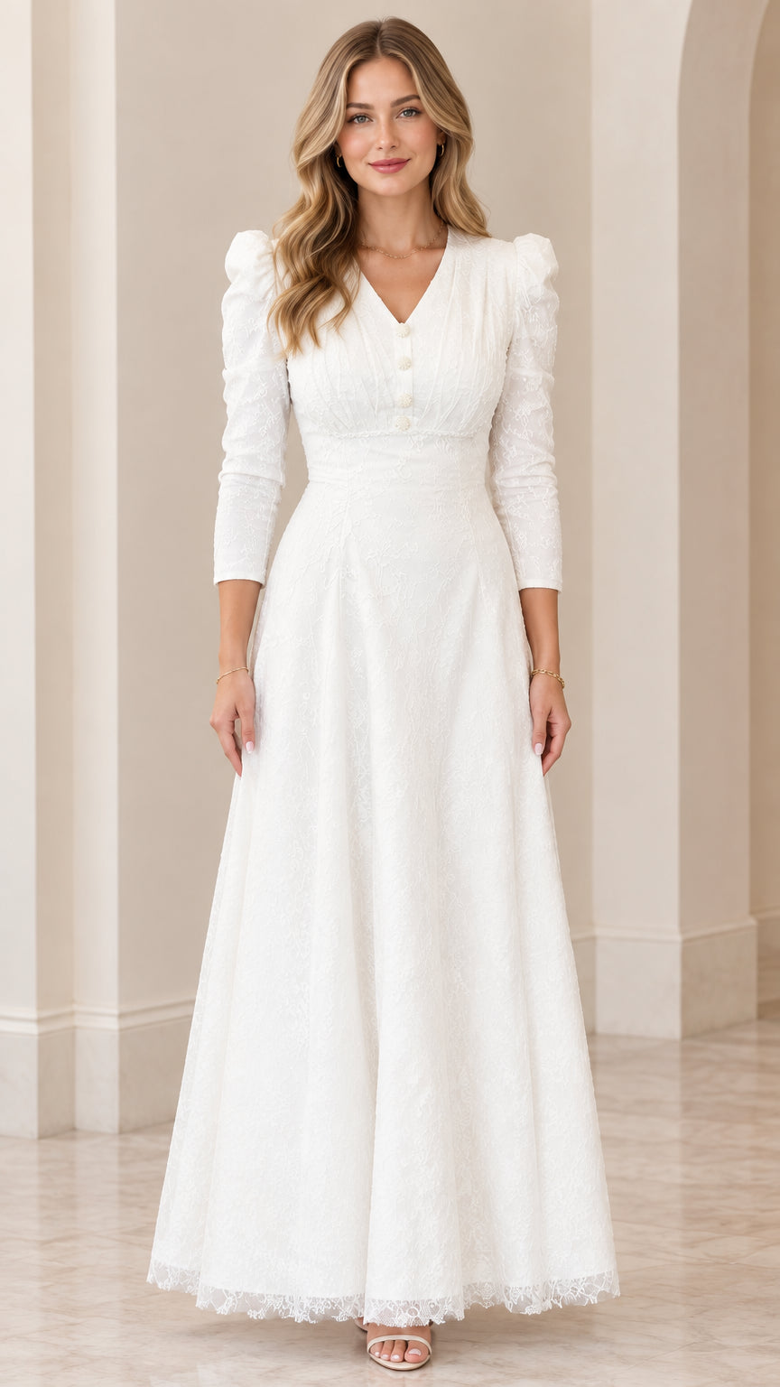 Front view of woman wearing elegant white lace maxi dress with V-neckline and 3/4 sleeves