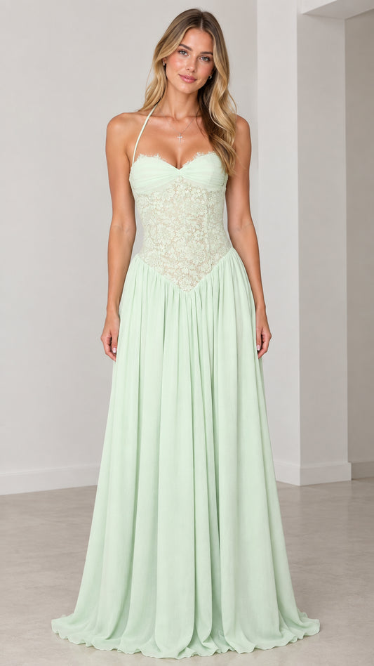 Front view of model wearing mint green lace bodice halter maxi dress