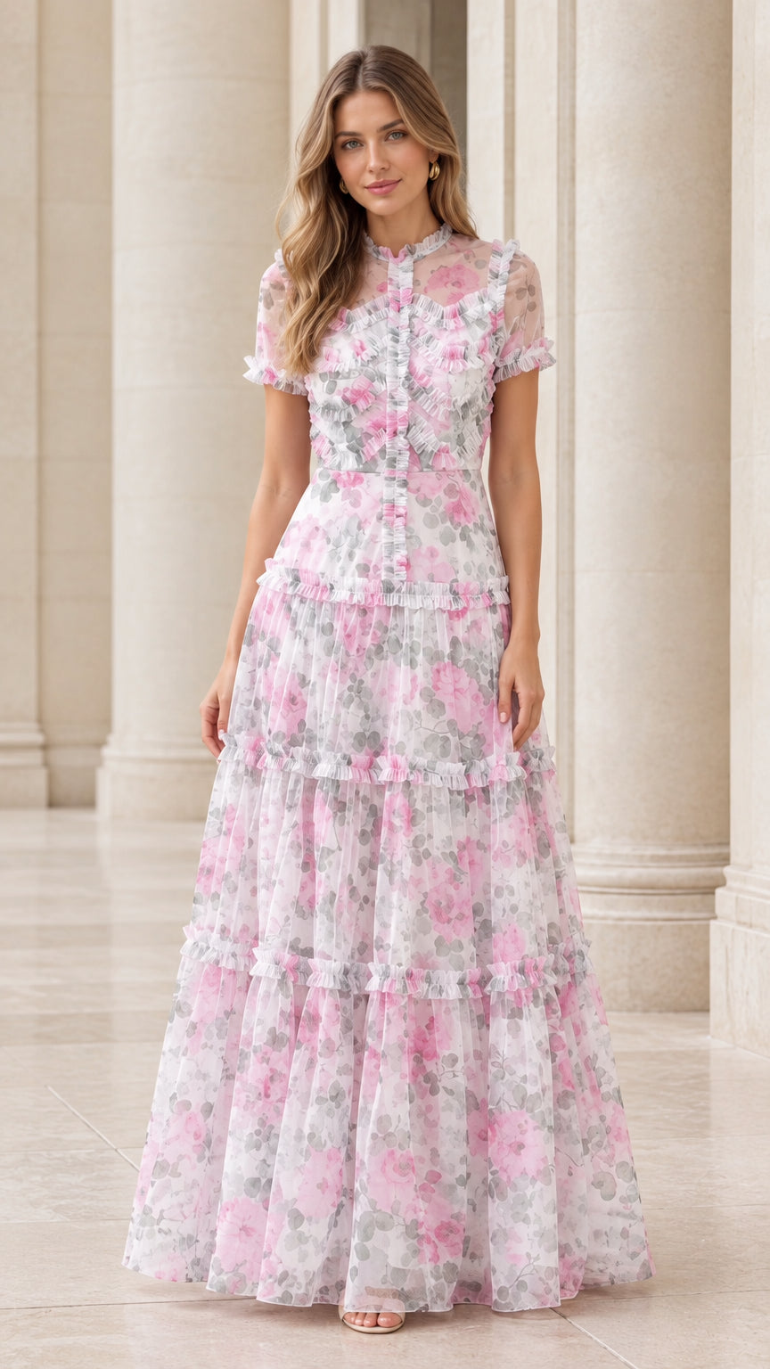Front full view of a woman wearing the pink floral ruffle tiered maxi dress
