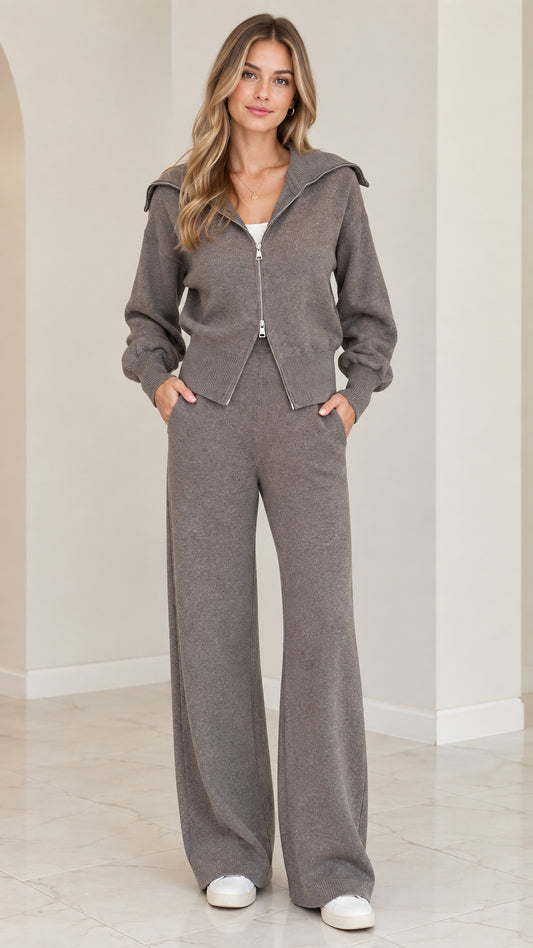 Front view of woman wearing charcoal grey 2-piece knit zip-up jacket and wide-leg loungewear set