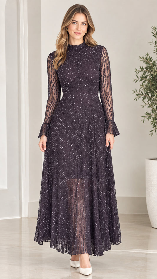 Front full-length view of woman wearing dark purple glitter pleated mock neck maxi dress
