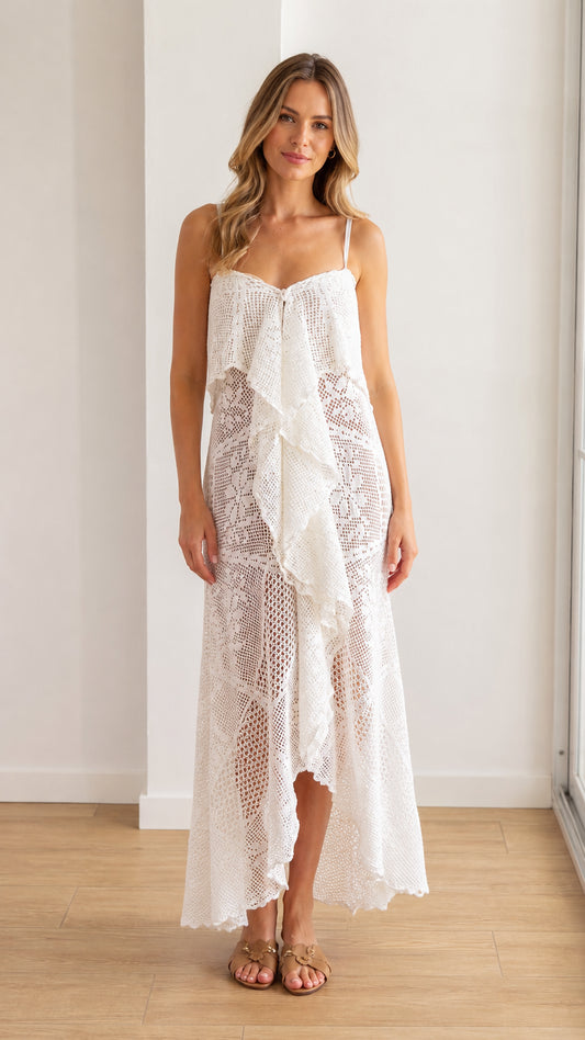 Front view of model wearing white crochet lace ruffle maxi dress