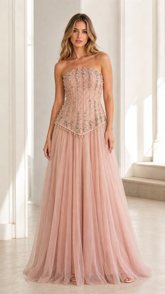 Front view of pink embellished strapless tulle evening gown