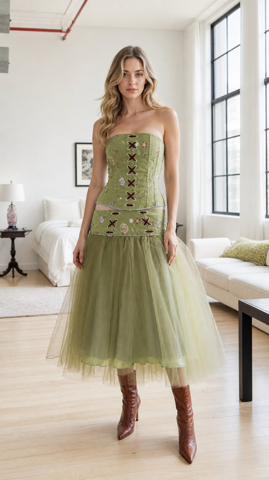 Front view of model wearing sage green embroidered corset and tulle midi skirt set