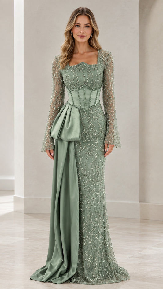 Front view of model wearing sage green beaded evening gown with corset bodice and satin side drape