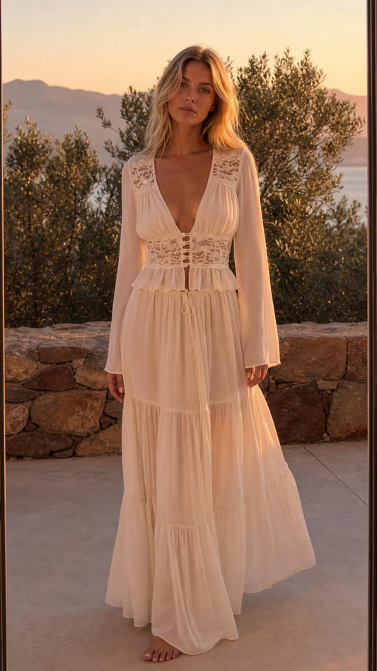 Front view of Ivory boho lace trim long sleeve maxi dress outdoors at sunset