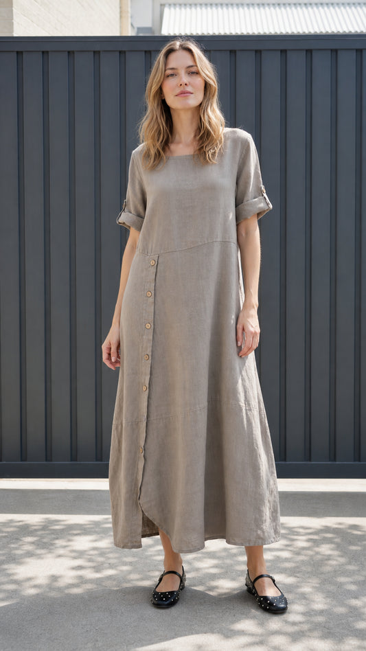 Front view of taupe asymmetrical button-front maxi dress with roll-up sleeves